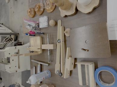 Custom fixtures and jigs laid out on the bench