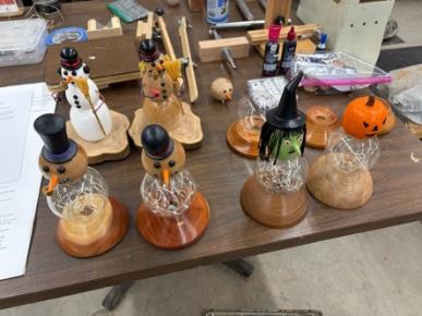 Finished glass bulb snowmen on display