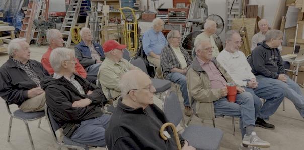 Members gathered at the Wheatly shop