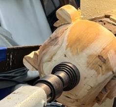 Handle forms taking shape on the lathe