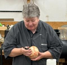 Peggy Schmid with a finished ribbon finial hollow form
