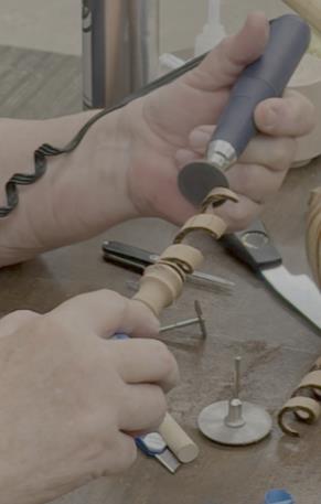 Removing waste ribbon material with carving tools