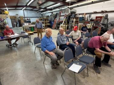Members gathered at the Wheatly shop