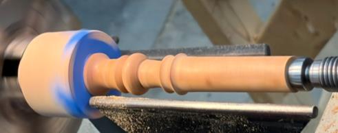 Finial tenon with thread relief groove and taped threads